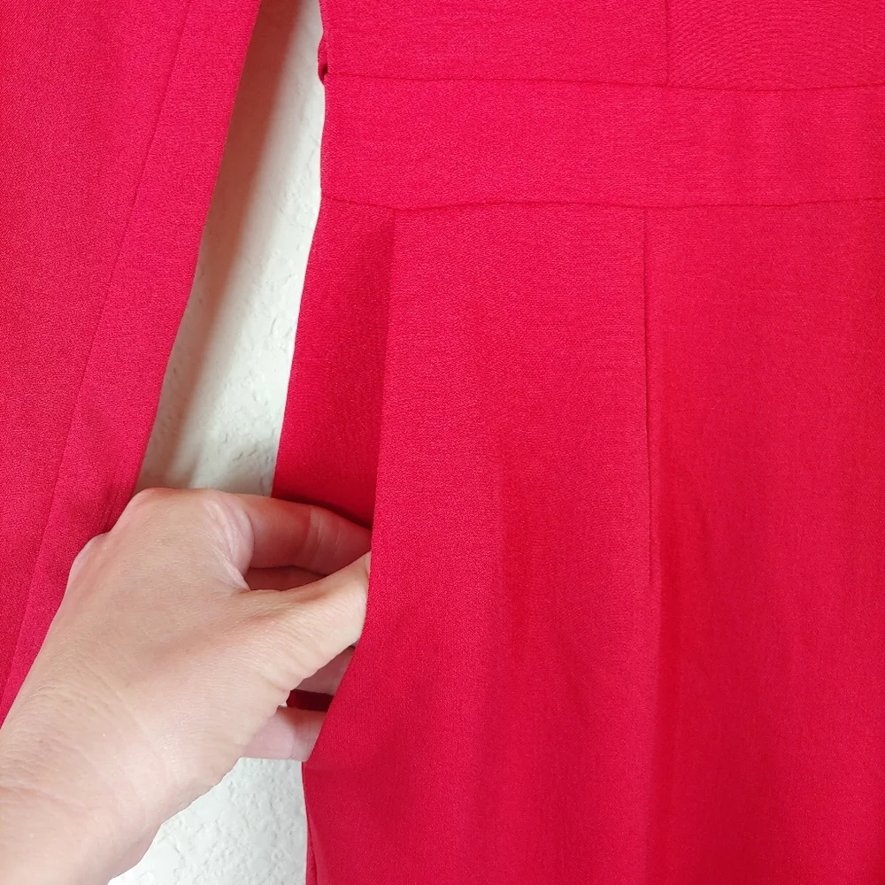 Adelyn Rae Red long sleeves jumpsuit slimly cut open back size small